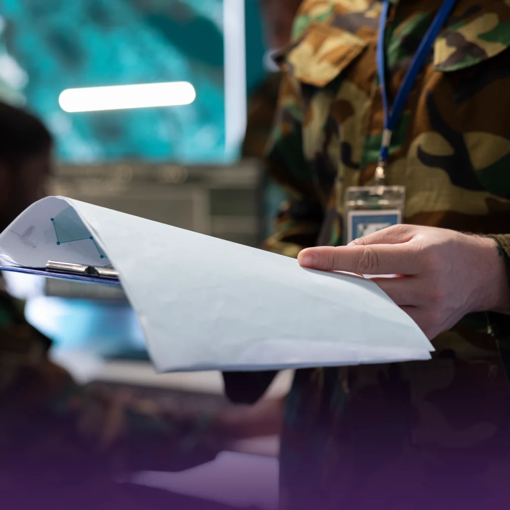 A militar office consulting a balance sheet, meaning When Military Spending Hits Your Balance Sheet